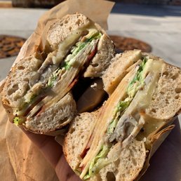 Roasted pork, brussels sprout mustard slaw, sliced apple, and taleggio cheese
