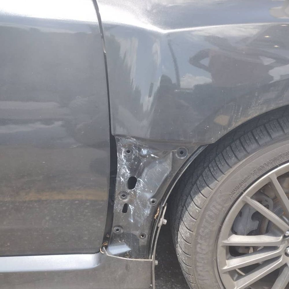 Butch's - passenger side panel that says WTX   missing - Auto Repair Near Me - Tampa, Florida