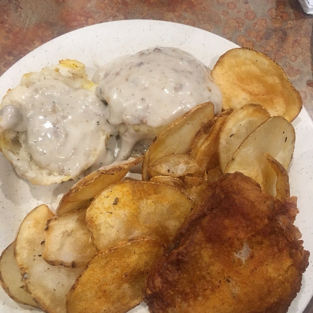 Fried chicken, kettle chips and biscuits with gravy. Fried chicken, kettle chips and biscuits with gravy.