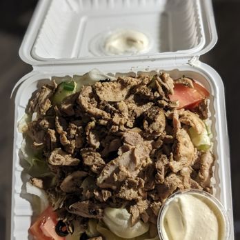 Pita & Grill - Chicken shawarma salad with garlic sauce - Mediterranean Near Me - Mississauga, Ontario Pita & Grill - Chicken shawarma salad with garlic sauce - Mediterranean Near Me - Mississauga, Ontario