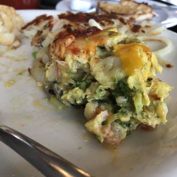 Sunrise Cafe - Veggie omelette. I just remember to take a photo before  I finish it off. Yummy! They mix the veggies in the egg and not just fold it . - American Near Me - San Clemente, California