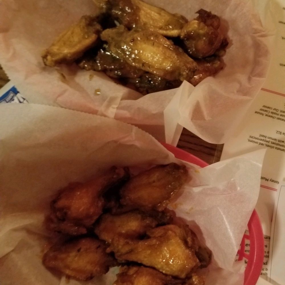 Jerk and buffalo sauce wings Jerk and buffalo sauce wings