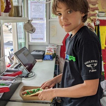 Little Engine Eatery - a young boy making a sandwich - Hot Dogs Near Me - Buena Vista, Colorado Little Engine Eatery - a young boy making a sandwich - Hot Dogs Near Me - Buena Vista, Colorado