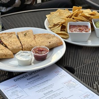 The Main Event - mixed veggies quesadilla (left) and tortilla chips with salsa and guacamole (right) - American Near Me - Farmingdale, New York The Main Event - mixed veggies quesadilla (left) and tortilla chips with salsa and guacamole (right) - American Near Me - Farmingdale, New York