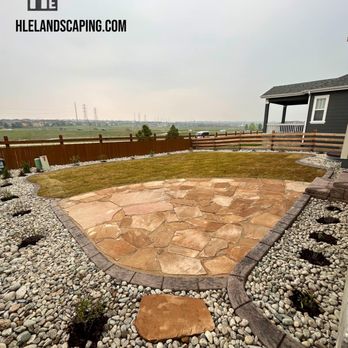 HLE Landscaping & Concrete - a view of a backyard patio - Landscaping Near Me HLE Landscaping & Concrete - a view of a backyard patio - Landscaping Near Me