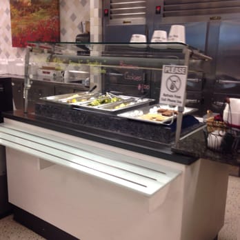 Currents Riverview Bistro - a buffet with a variety of food items - New American Near Me - Jacksonville, Florida
