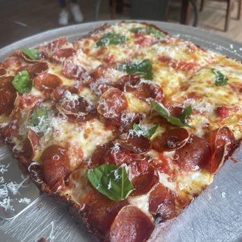 Krust - Half pepperoni and half cheese pie with hot honey sauce - Desserts Near Me - Tavernier, Florida Krust - Half pepperoni and half cheese pie with hot honey sauce - Desserts Near Me - Tavernier, Florida