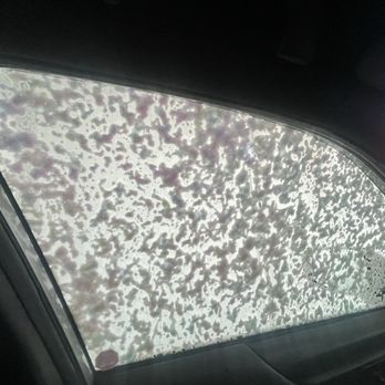 Canmore Sunshine Laundromat - My SUV window during a car wash - Laundromat Near Me - Canmore, Alberta
