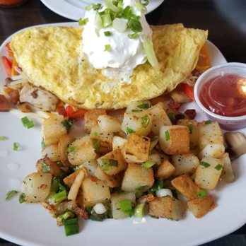 Live Oak Cafe - West Coast Omelet with scallion potatoes ($13) Well worth it. Loaded with ingredients - Breakfast & Brunch Near Me - Santa Barbara, California Live Oak Cafe - West Coast Omelet with scallion potatoes ($13) Well worth it. Loaded with ingredients - Breakfast & Brunch Near Me - Santa Barbara, California