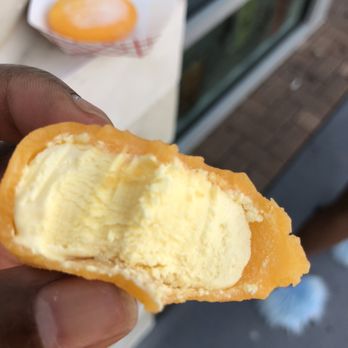 Kokee Tea - a hand holding a half eaten pastry - Bubble Tea Near Me - Virginia Beach, Virginia