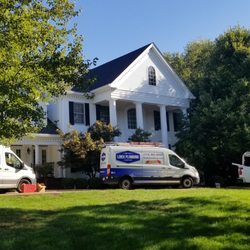 Linek Plumbing - Linek Plumbing Company vans on site, providing professional residential plumbing services throughout the Greater St. Louis area.