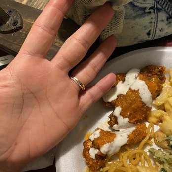 Fire Wings - You're looking at fried skin on bones... there is literally NO chicken In this pic - Chicken Wings Near Me - Sacramento, California
