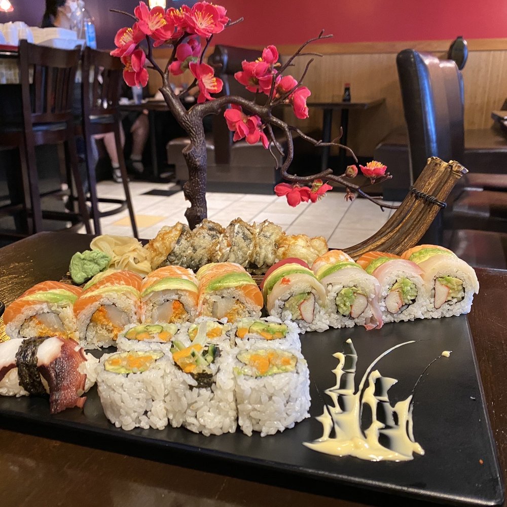Sushi Ai - a platter of sushi with a cherry tree in the background - Sushi Bars Near Me - O'Fallon, Missouri Sushi Ai - a platter of sushi with a cherry tree in the background - Sushi Bars Near Me - O'Fallon, Missouri