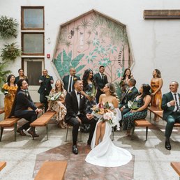 Their gorgeous pink mural doubles as a backdrop and a sliding door that leads to the dining room. Their gorgeous pink mural doubles as a backdrop and a sliding door that leads to the dining room.