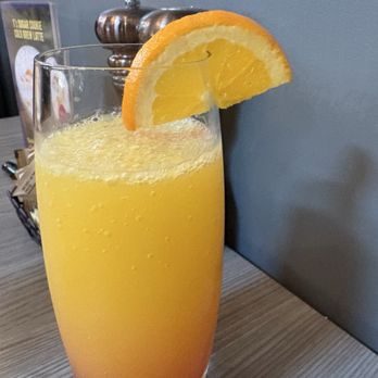 T's Restaurant - Tequila sunrise mimosa - Breakfast & Brunch Near Me - Narragansett, Rhode Island T's Restaurant - Tequila sunrise mimosa - Breakfast & Brunch Near Me - Narragansett, Rhode Island