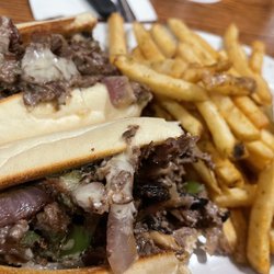Crossing Grill & Bar - Philly Cheese Steak Sandwich with season fries (garlic)