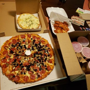 Sunnyside Pizza - The 25 dollar family meal deal and we added the cheesy garlic bread. It's all delicious! - Pizza Near Me - Clovis, California Sunnyside Pizza - The 25 dollar family meal deal and we added the cheesy garlic bread. It's all delicious! - Pizza Near Me - Clovis, California