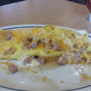 IHOP - Ham and Cheese Omelet infused with a cheese sauce :( - American Near Me - Lansing, Illinois