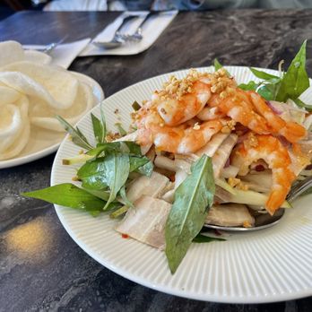 Dan Da - Shrimp, pork belly, papaya salad with shrimp chips. A great was to begin the meal with an explosion of flavors! - Vietnamese Near Me - Aurora, Colorado