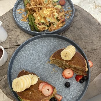 The Real Coconut - Eggs Benedict and plantain powder pancakes - Salad Near Me - Tulum, ROO The Real Coconut - Eggs Benedict and plantain powder pancakes - Salad Near Me - Tulum, ROO