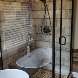 Canton Glass - Walt did a great job on shower enclosure. Straight and solid the framed bronze matches perfect.