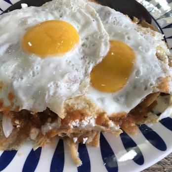 Chilakiles - Large plate of chilaquiles with egg. I had to ask for onion. - Mexican Near Me - Playa del Carmen, ROO Chilakiles - Large plate of chilaquiles with egg. I had to ask for onion. - Mexican Near Me - Playa del Carmen, ROO