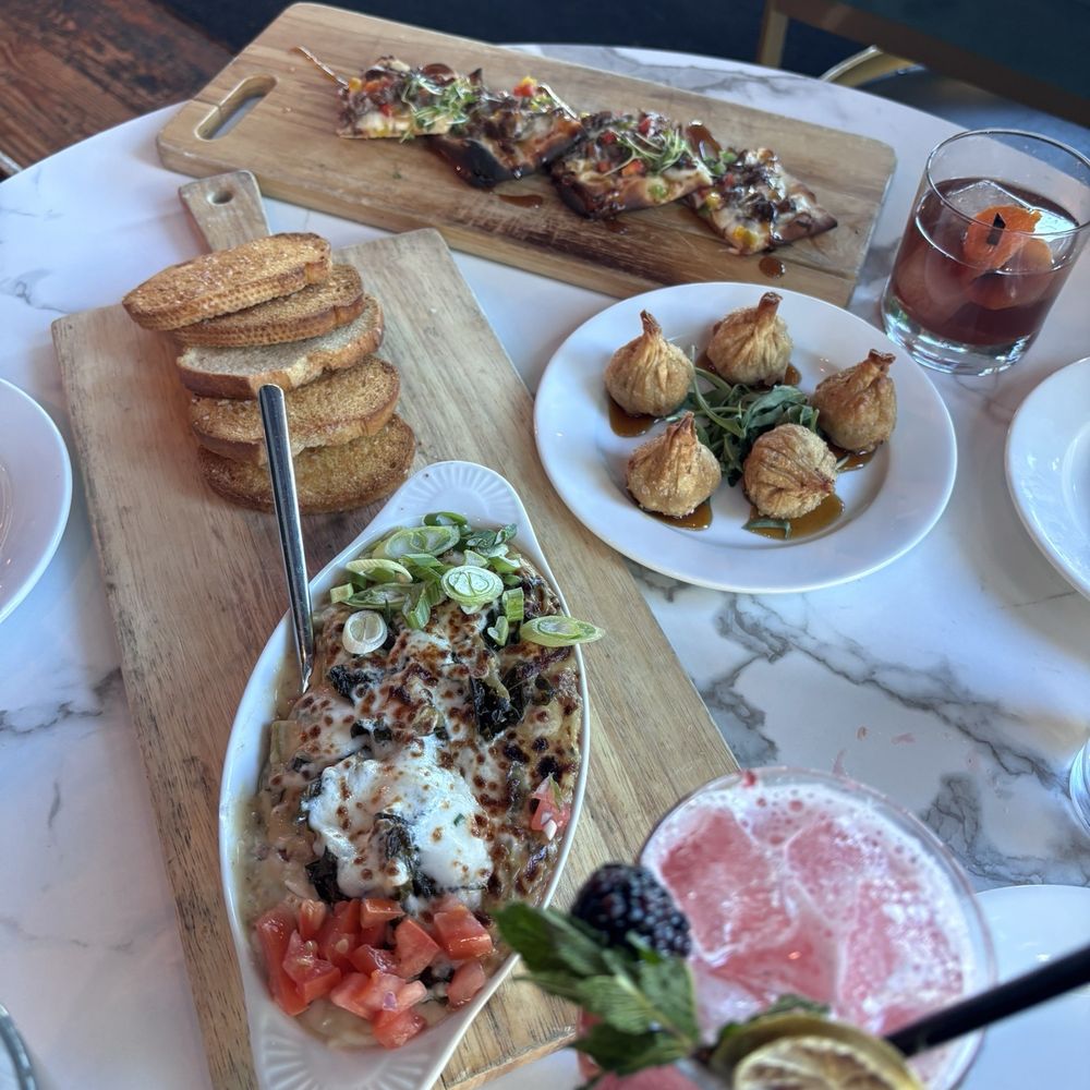 Tryst Kitchen + Cocktails - Collard Dip Brisket flatbread forgot the other app name  Berry mojito mocktail - Cajun/Creole Near Me - San Antonio, Texas