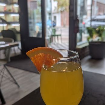 The Kitchen Sink - Mango and pineapple mimosa - Sandwiches Near Me - Wilmington, North Carolina The Kitchen Sink - Mango and pineapple mimosa - Sandwiches Near Me - Wilmington, North Carolina