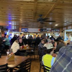 Shooters Sports Bar - Knotty pine here and there and up there too.