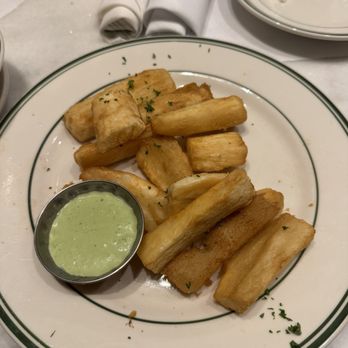 Sazon Cuban Cuisine - 6 Pieces Yuca Frita con Salsa de Cilantro - Cuban Near Me - Miami Beach, Florida Sazon Cuban Cuisine - 6 Pieces Yuca Frita con Salsa de Cilantro - Cuban Near Me - Miami Beach, Florida
