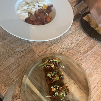 Vicia - Crispy potatoes, cherry tomato salad - New American Near Me - St. Louis, Missouri Vicia - Crispy potatoes, cherry tomato salad - New American Near Me - St. Louis, Missouri