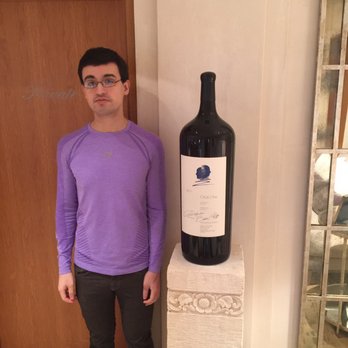 Opus One Winery - Mitchell beside a LARGE format bottle - Wineries Near Me - Oakville, California Opus One Winery - Mitchell beside a LARGE format bottle - Wineries Near Me - Oakville, California