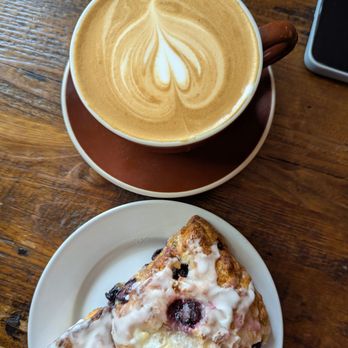 The Bean Pedaler - Latte and lemon blueberry scone - Coffee & Tea Near Me - Cañon City, Colorado The Bean Pedaler - Latte and lemon blueberry scone - Coffee & Tea Near Me - Cañon City, Colorado