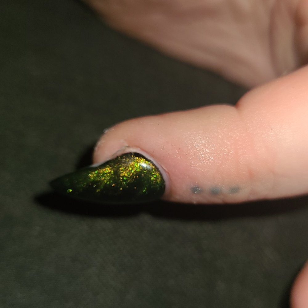 Warped nail, not fully covering side, burned cuticle