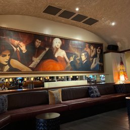 The cozy lounge area opposite the bar. Great space. The cozy lounge area opposite the bar. Great space.