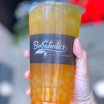 Bobaholics - a person holding a cup of boba - Bubble Tea Near Me - San Jose, California
