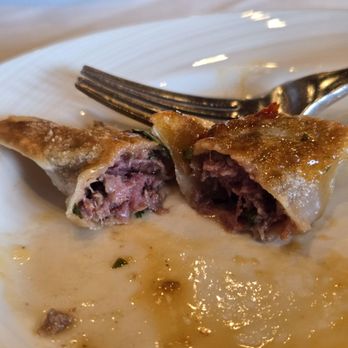 Eddie Merlot's - Inside the filet mignon potstickers - Steakhouses Near Me - Englewood, Colorado