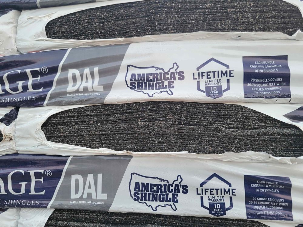 Slide of T Rock Roofing & Construction