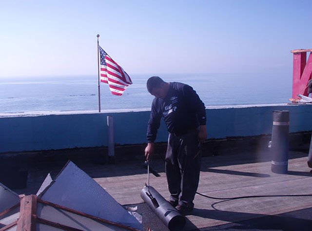 Slide of Midwest Roofing