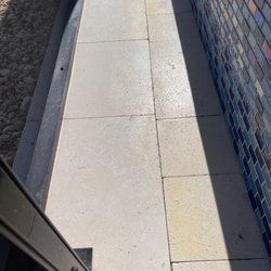 Paver Protectors - It's all over the place. Deck, coping, under the overhang, around the spa. Bad deal