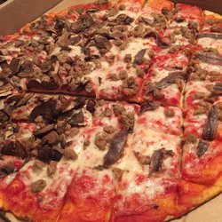 Cassano's Pizza & Subs - Half sausage&mushroom other half sausage & anchovy.