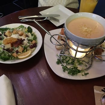 Beerbistro - Fondue with salad - Bistros Near Me - Toronto, Ontario Beerbistro - Fondue with salad - Bistros Near Me - Toronto, Ontario
