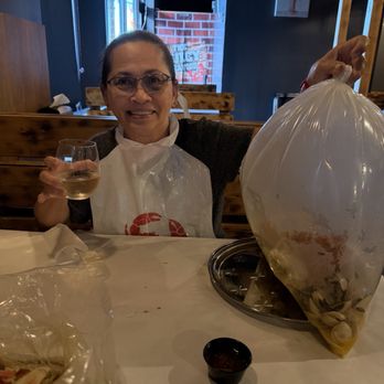 The Juicy Seafood - Snow crab, clams boiled in a bag plus potatoes and corn cob - Cajun/Creole Near Me - Aurora, Colorado The Juicy Seafood - Snow crab, clams boiled in a bag plus potatoes and corn cob - Cajun/Creole Near Me - Aurora, Colorado