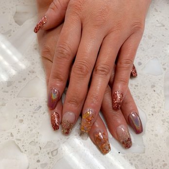 Venus Nails - made my day today :) loving each nail having a different design esp the glass looking ones with bling - Nail Salons Near Me - Katy, Texas