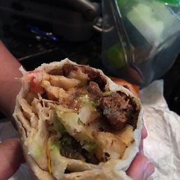 Too much flour tortilla in this burrito, where's the cheese?