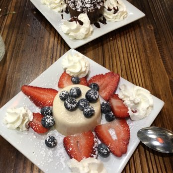 Tuscan Hills - Panna cotta with mixed berries and chocolate lava cake - Italian Near Me - Forest Hills, New York Tuscan Hills - Panna cotta with mixed berries and chocolate lava cake - Italian Near Me - Forest Hills, New York