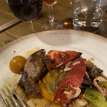 Off Alley - Lamb tongue, tomatoes, onions, and mouth-watering sauce. - Wine Bars Near Me - Seattle, Washington Off Alley - Lamb tongue, tomatoes, onions, and mouth-watering sauce. - Wine Bars Near Me - Seattle, Washington