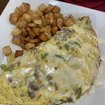 Oy! - Philly Cheesesteak omelette topped with Queso - Breakfast & Brunch Near Me - Buford, Georgia Oy! - Philly Cheesesteak omelette topped with Queso - Breakfast & Brunch Near Me - Buford, Georgia