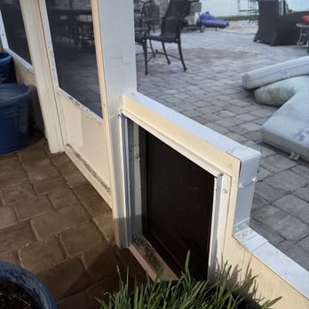 Screen'D In - Dog door and replacement lanai screens. - General Contractors Near Me