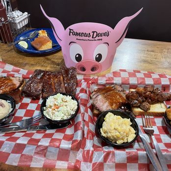 Famous Dave's - The plate on the left was supposed to have brisket.. you can see that the meat in both top left corners as the exact same - Barbeque Near Me - Rancho Cucamonga, California